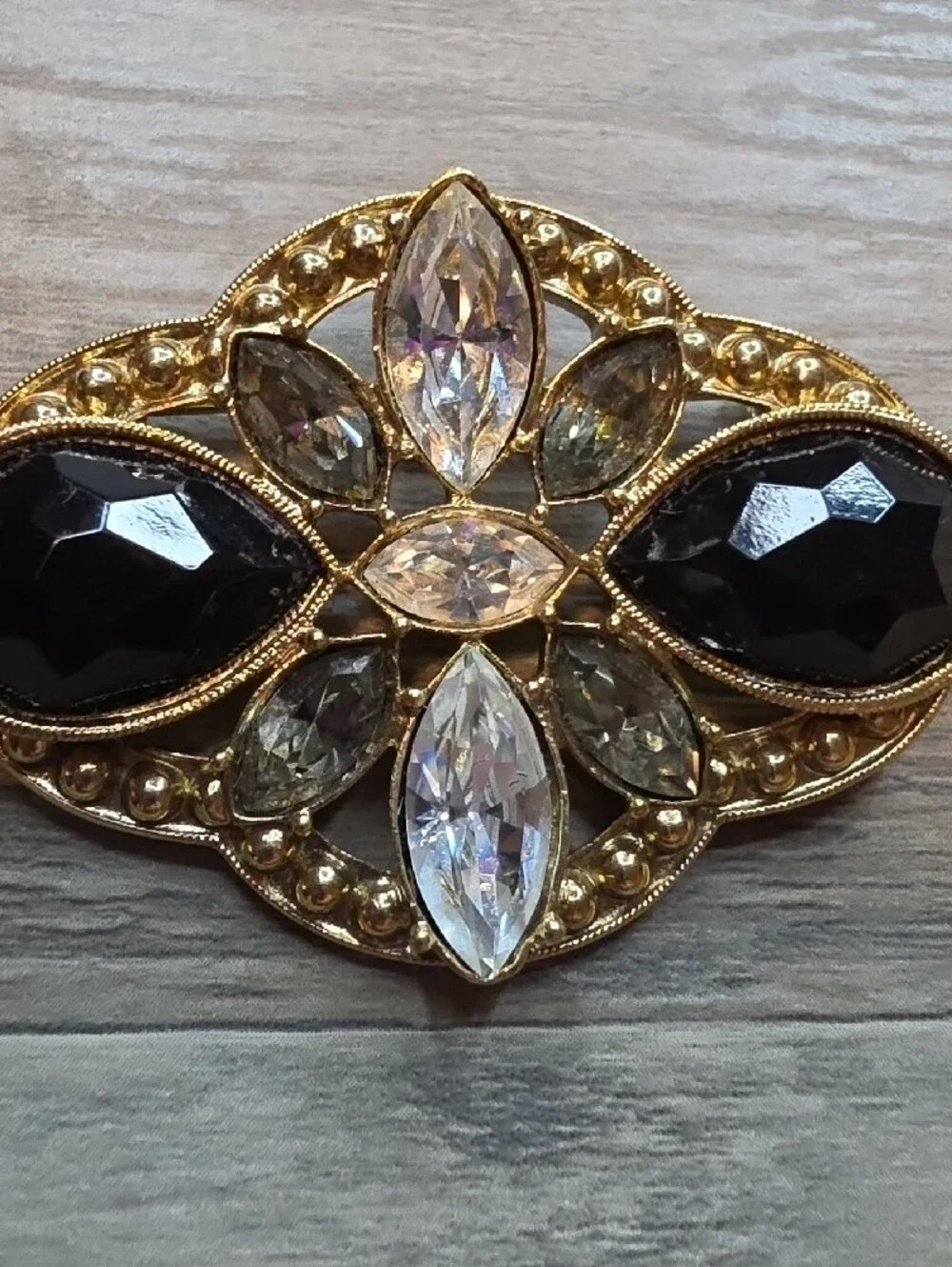 Gold Tone Black And Clear Stone Brooch